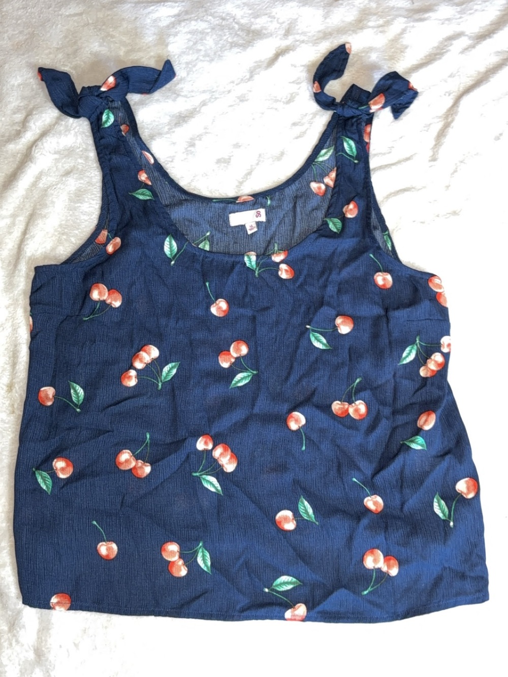 SO brand tank top future a navy blue cherry print with a scoop neck